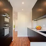 Bright Beachside Flat With Terrace By Hostwise